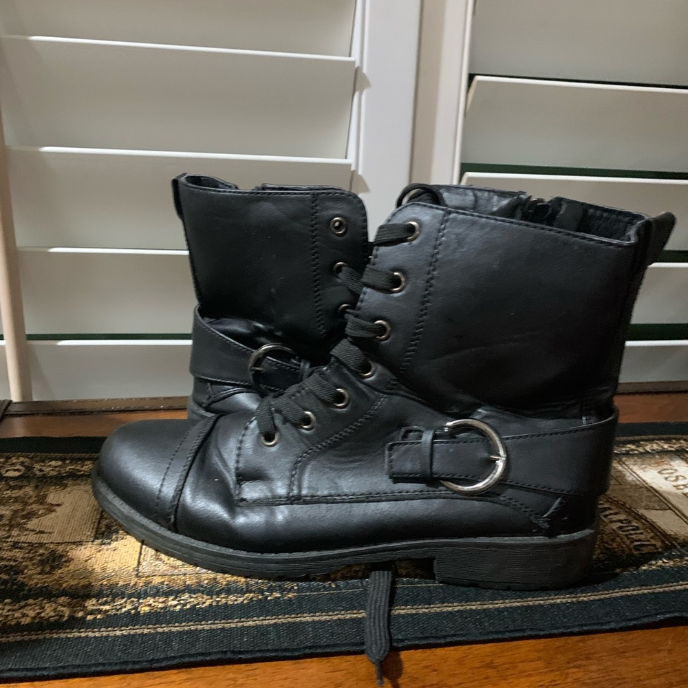 Black leather strap up boots with buckle